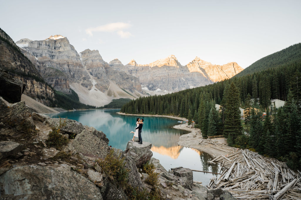 Couple embraces as the sun comes up in Banff National Park
