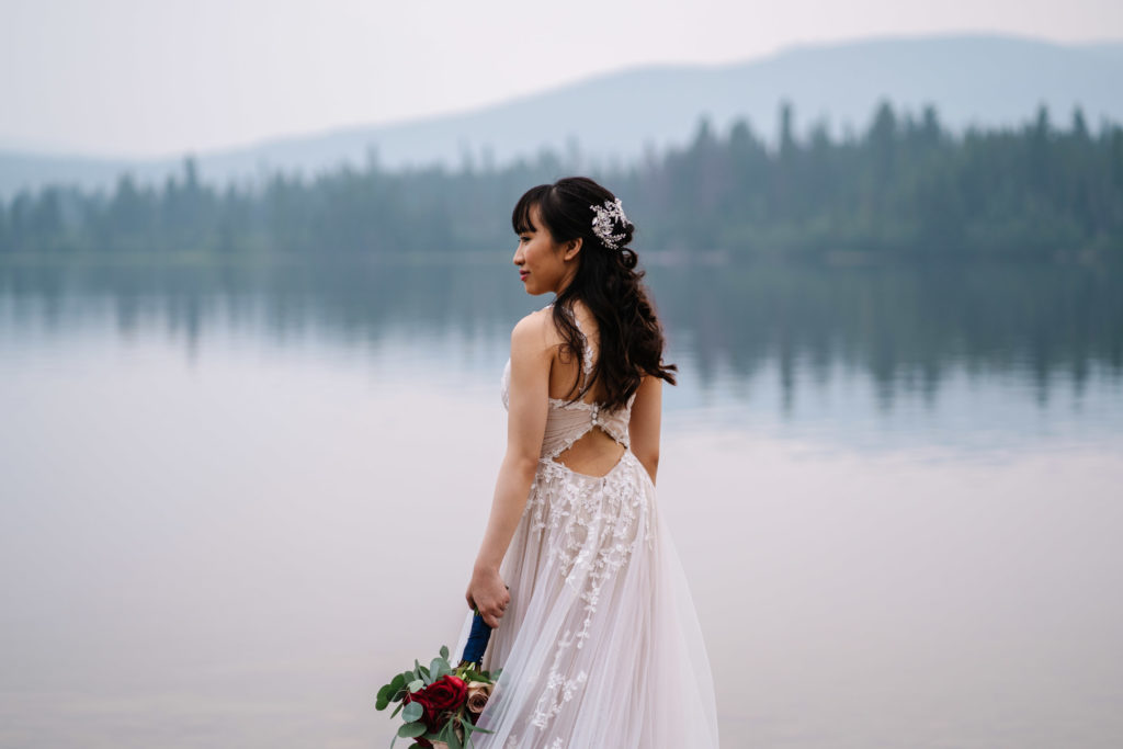 Bride looks off into distance at Pyramid Lake