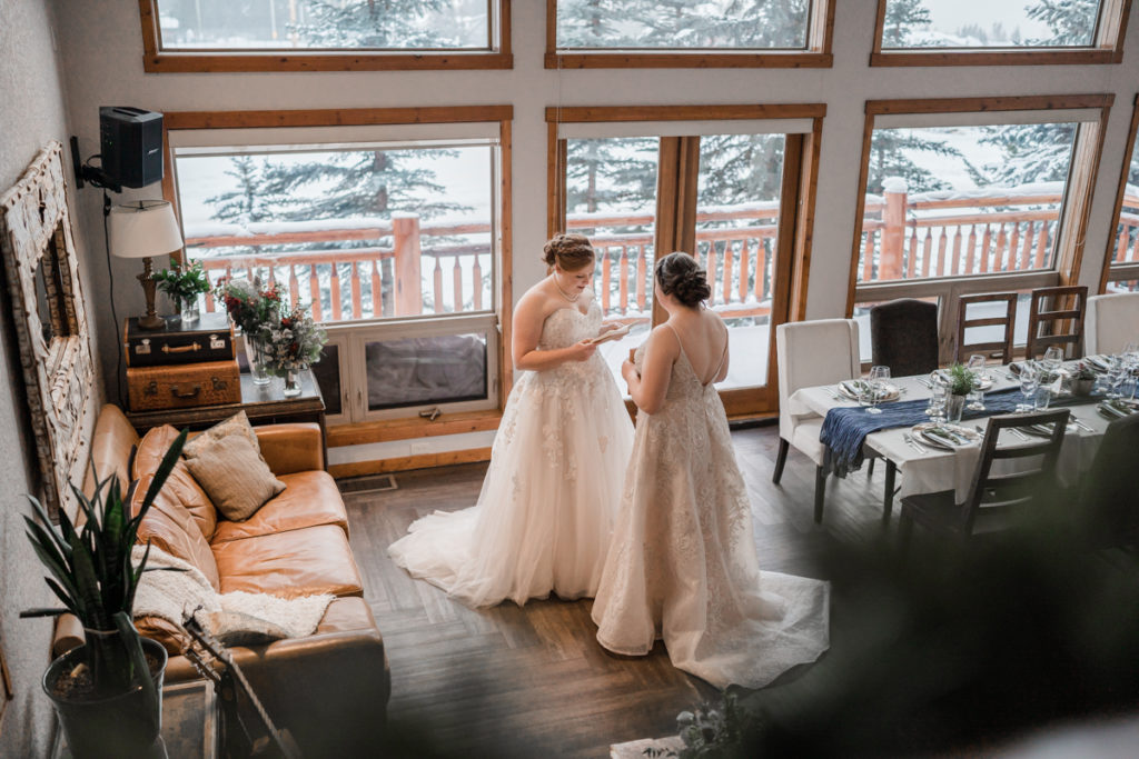 Brides read private vows to each other at A Bear and Bison Inn in Alberta.