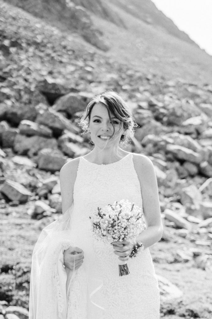 Black and white portrait of bride during hiking elopement in Kananaskis.