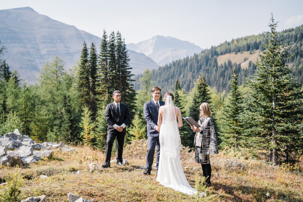 Wedding ceremony in the mountains in Kananaskis, Alberta. 