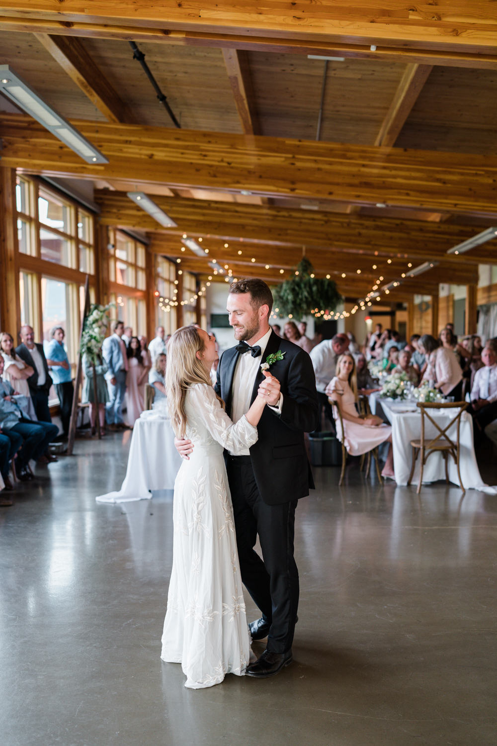 bride and groom dance together for first dance at Fenlands in Banff 