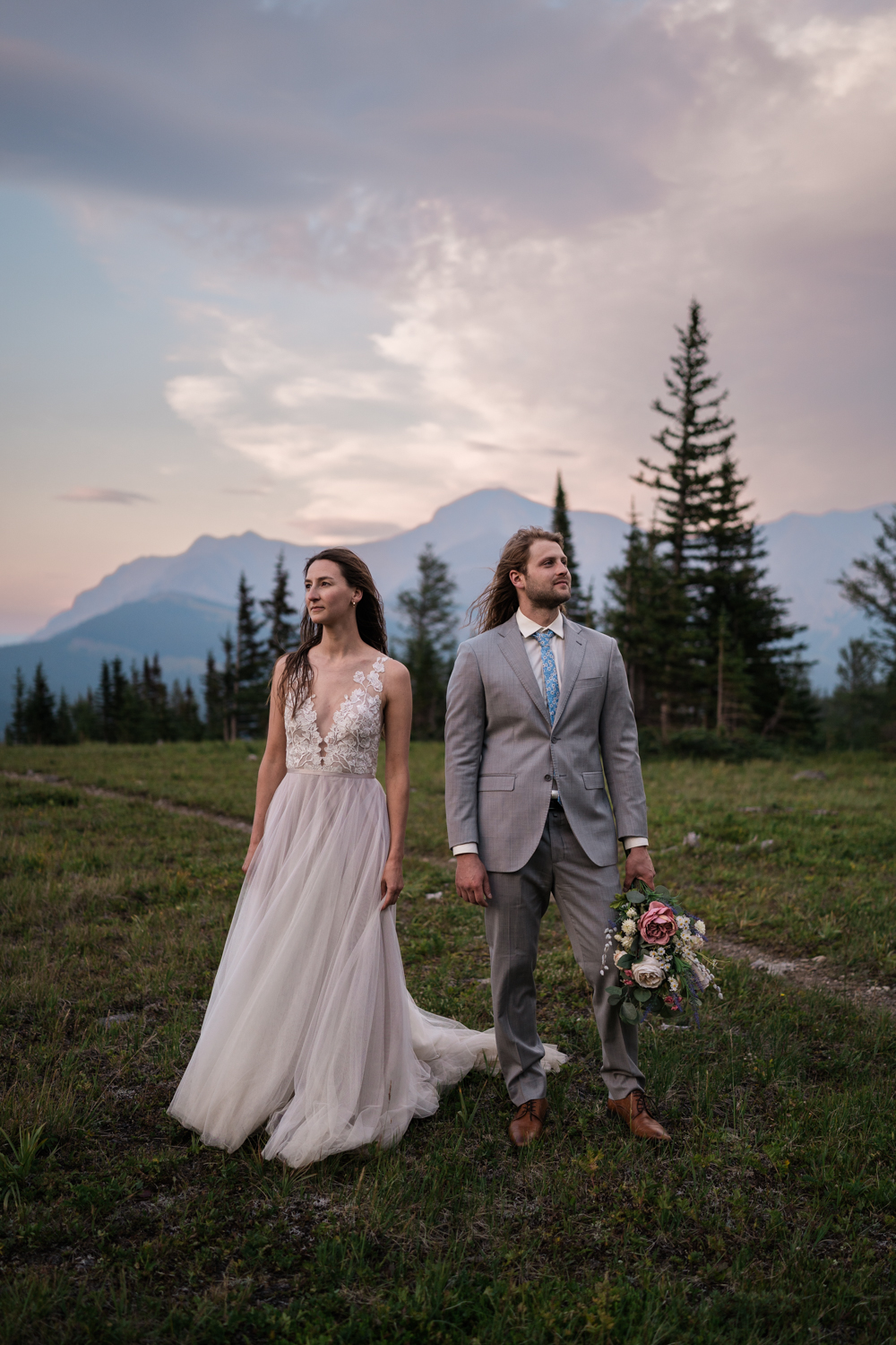 Spectacular colors painting the sky during a memorable Alberta camping elopement in Kananaskis.